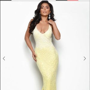 Size 2. Never worn or altered.